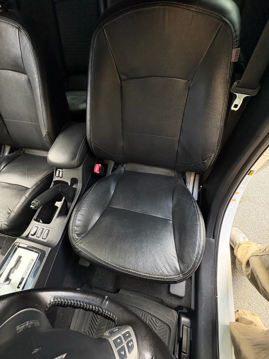 Cars: the driver's seat of a Mitsubishi Lancer after a detail