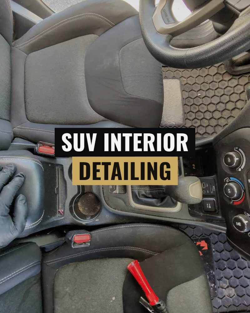 SUV interior detailing: the console of a Jeep Cherokee being cleaned